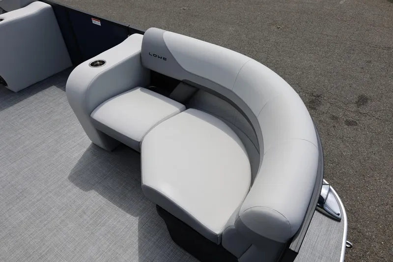 Slide: The Image of Gray seating area on 2026 Lowe SS 210 CL boat, featuring curved design and cup holder. - 42