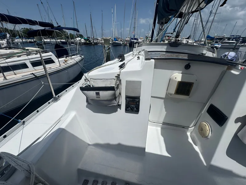 Slide: The Image of 1988 Beneteau First 285 sailboat docked in marina. - 25