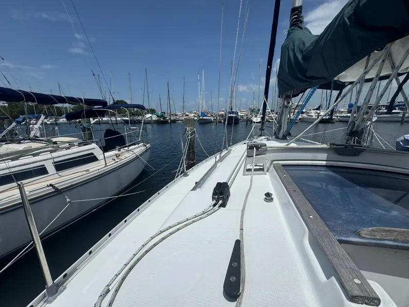 Slide: The Image of Beneteau First 285 sailboat in harbor, year 1988. - 26