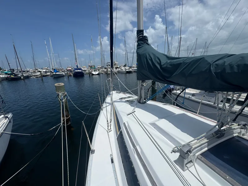 Slide: The Image of Beneteau First 285 sailboat in harbor, year 1988. - 28