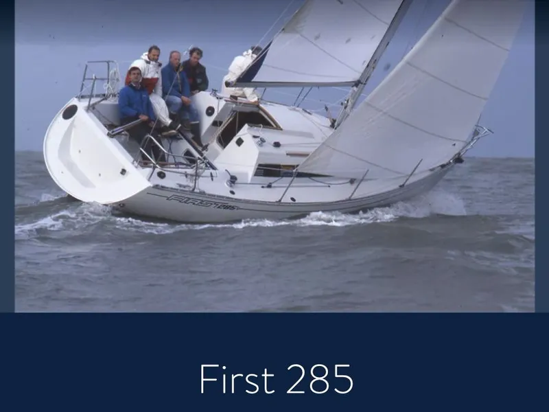 Slide: The Image of 1988 Beneteau First 285 sailboat navigating the sea. - 37