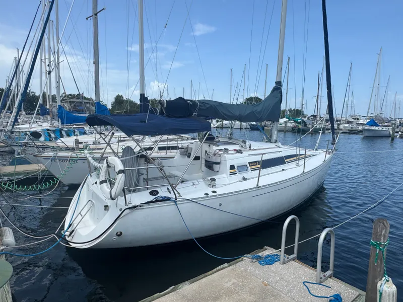 Slide: The Image of 1988 Beneteau First 285 sailboat docked in marina. - 7