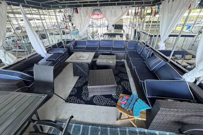 Slide: The Image of Luxurious 2006 Catamaran Cruisers Aqua Cruiser Executive with spacious outdoor seating area. - 25