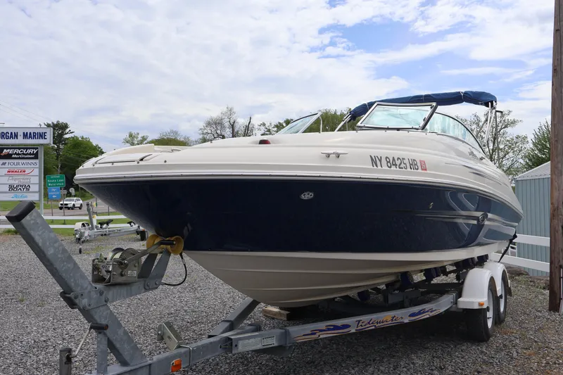 Slide: The Image of 2007 Sea Ray 220 Sundeck boat on trailer at Morgan Marine dealership. - 4