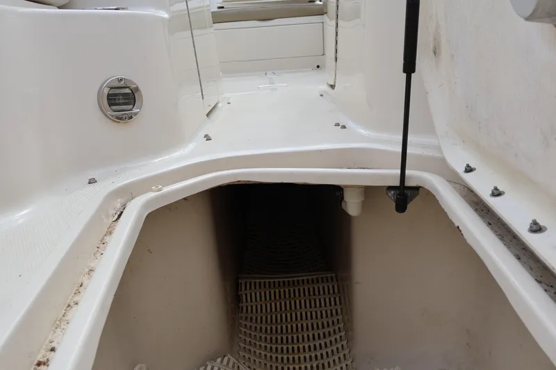 Slide: The Image of Interior view of a 2007 Sea Ray 220 Sundeck boat storage compartment. - 40