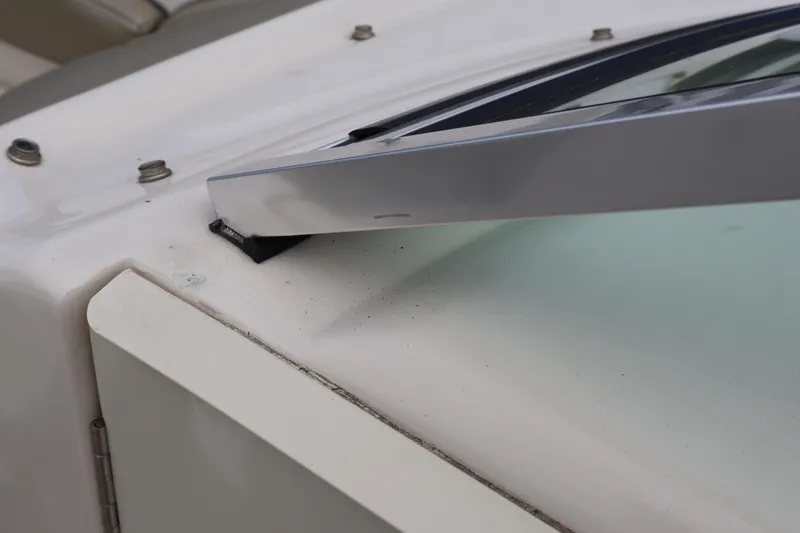 Slide: The Image of Close-up of 2007 Sea Ray 220 Sundeck windshield detail. - 48