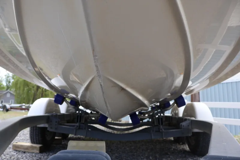 Slide: The Image of Underside view of a 2007 Sea Ray 220 Sundeck boat on a trailer. - 60