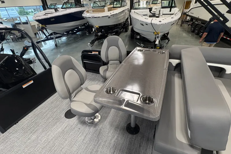 Slide: The Image of Interior of 2027 Premier 250 Sunsation RS - CL pontoon boat with seating and table. - 9