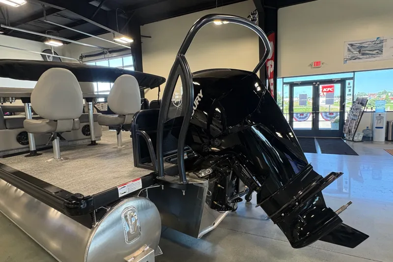 Slide: The Image of 2027 Premier 250 Sunsation RS - CL pontoon boat with Mercury outboard motor in showroom. - 5
