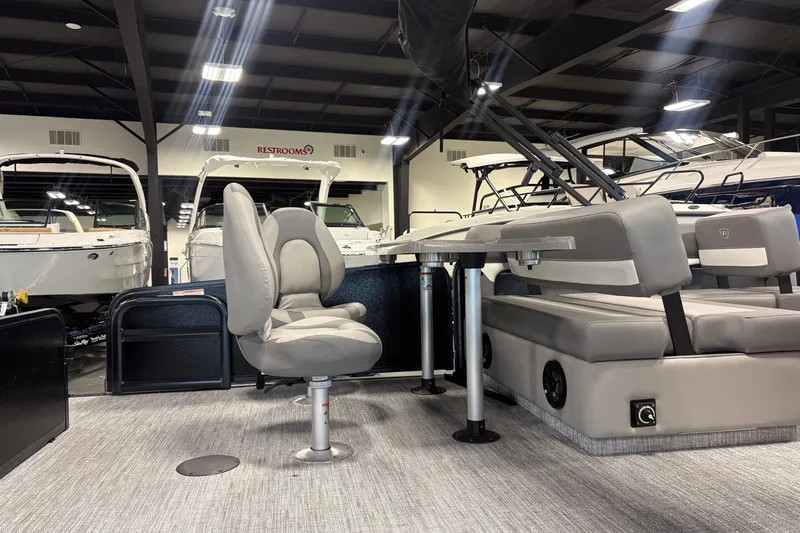 Slide: The Image of Interior of 2027 Premier 250 Sunsation RS - CL pontoon boat with seating and table. - 18