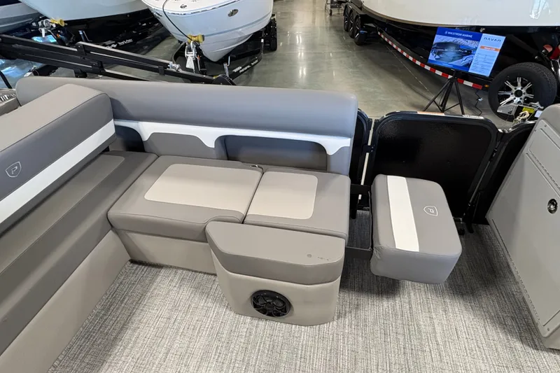 Slide: The Image of Premier 250 Sunsation RS - CL 2027 boat interior with gray seating and modern design. - 15
