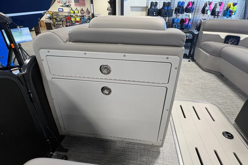 Slide: The Image of Interior of 2027 Premier 250 Sunsation RS - CL boat, featuring sleek seating and storage compartments. - 16