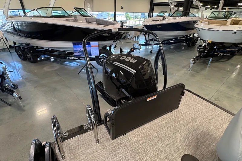 Slide: The Image of 2027 Premier 250 Sunsation RS - CL pontoon boat in showroom with other boats. - 6