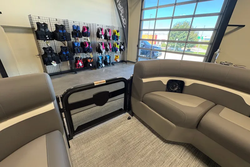 Slide: The Image of Premier 250 Sunsation RS - CL interior with life jackets on display in showroom. - 10