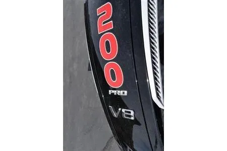 Slide: The Image of Close-up of 2026 Lowe Fishing Machine 1875 with 200 Pro V8 engine decal. - 16