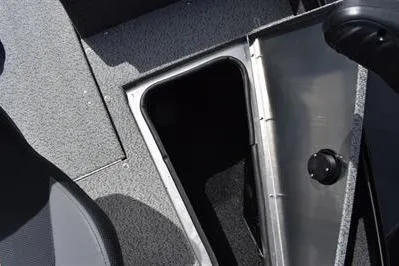 Slide: The Image of 2026 Lowe Fishing Machine 1875 boat storage compartment with open hatch. - 30