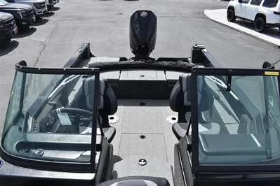 Slide: The Image of 2026 Lowe Fishing Machine 1875 boat with dual consoles and spacious seating. - 31