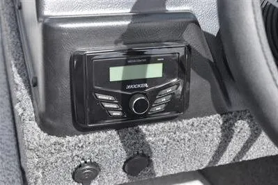 Slide: The Image of 2026 Lowe Fishing Machine 1875 dashboard with Kicker audio system. - 36