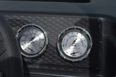 Slide: The Image of Dashboard gauges of 2026 Lowe Fishing Machine 1875 boat, showing speed and RPM. - 37
