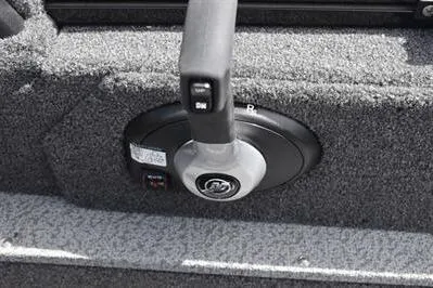 Slide: The Image of 2026 Lowe Fishing Machine 1875 boat throttle control on carpeted interior. - 39