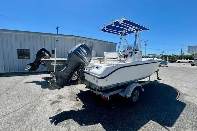 Slide: The Image of 2007 Century 1801 Center Console boat with Yamaha outboard motor on trailer. - 10