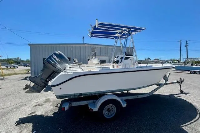 Slide: The Image of 2007 Century 1801 Center Console boat on trailer with Yamaha outboard motor. - 2
