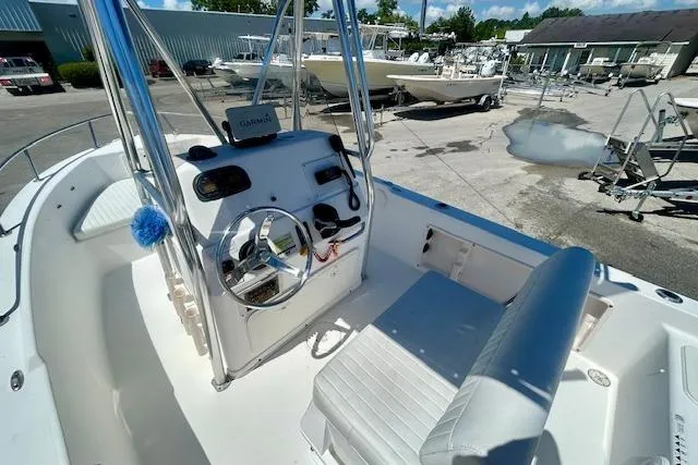 Slide: The Image of 2007 Century 1801 Center Console boat interior with steering wheel and seating. - 9