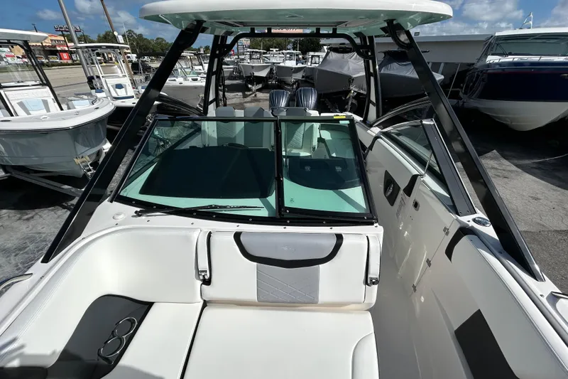 Slide: The Image of 2023 Chaparral 280 OSX boat interior with sleek design and modern features. - 18