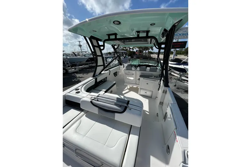 Slide: The Image of 2023 Chaparral 280 OSX boat interior with seating and modern design. - 6