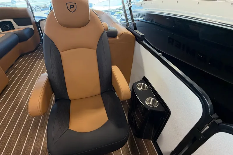 Slide: The Image of Luxurious seating in 2027 Premier 230 Solaris RF - CL boat interior with cup holders. - 18