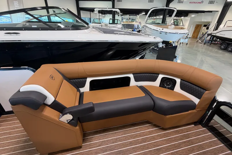 Slide: The Image of Luxurious seating on 2027 Premier 230 Solaris RF - CL boat in showroom. - 6