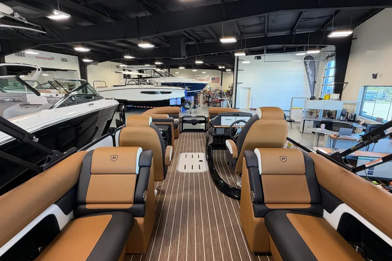 Slide: The Image of Luxurious 2027 Premier 230 Solaris RF - CL boat interior in showroom setting. - 19