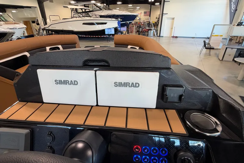 Slide: The Image of Interior view of 2027 Premier 230 Solaris RF - CL boat with Simrad navigation system. - 17