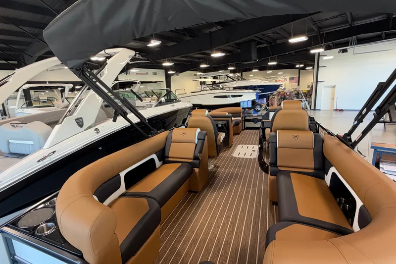 Slide: The Image of Luxurious interior of 2027 Premier 230 Solaris RF - CL boat in showroom. - 22