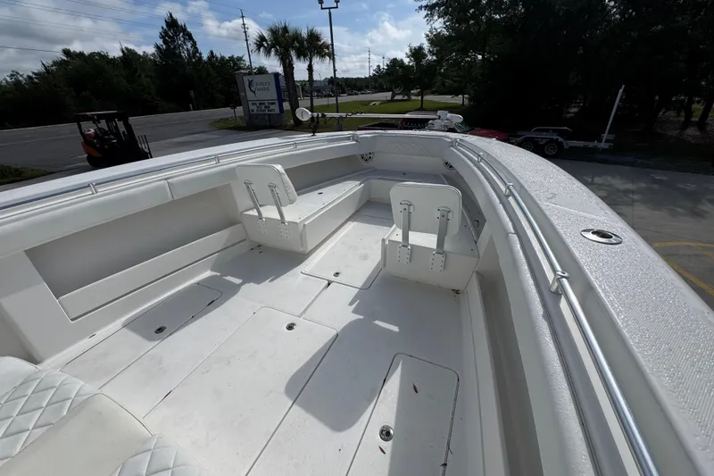 Slide: The Image of 2017 Invincible 39 Open Fisherman boat interior with seating and storage compartments. - 16