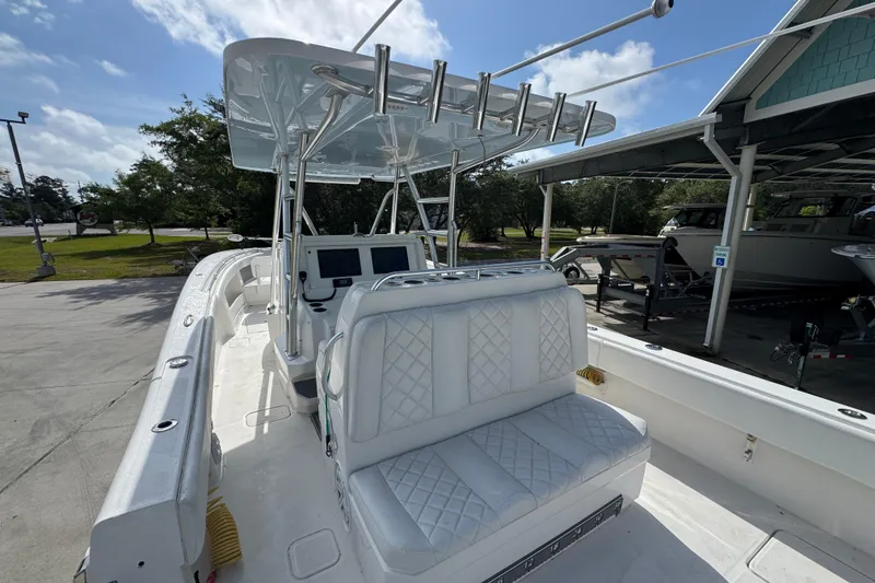 Slide: The Image of 2017 Invincible 39 Open Fisherman boat with white seating and modern helm station. - 26