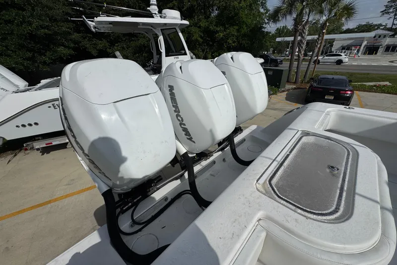 Slide: The Image of 2017 Invincible 39 Open Fisherman with triple Mercury outboard engines. - 32