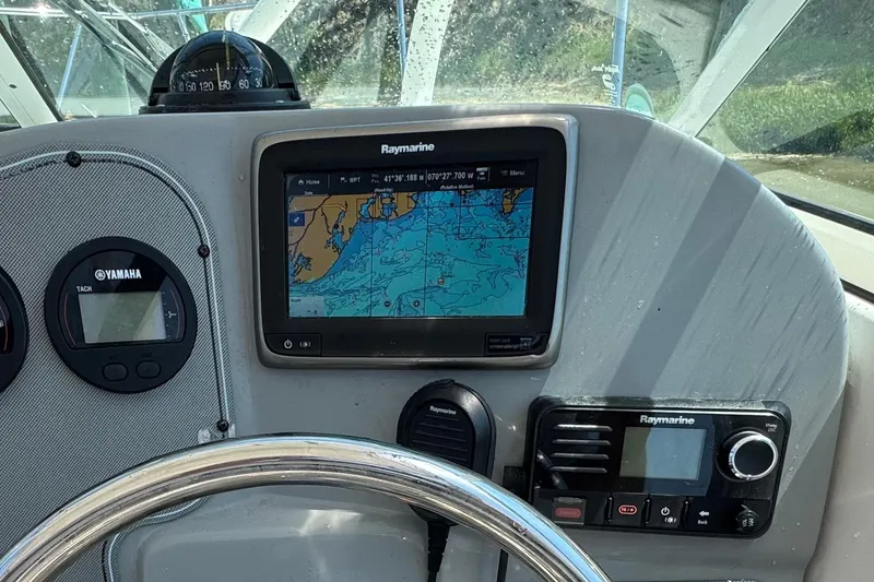 Slide: The Image of Dashboard of a 2016 Wellcraft 252 Coastal boat with navigation equipment. - 14