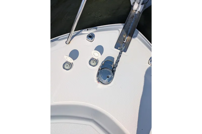 Slide: The Image of Bow deck of 2016 Wellcraft 252 Coastal boat with anchor chain and fittings. - 16