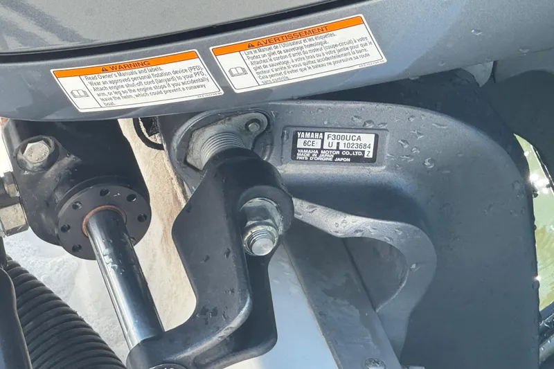 Slide: The Image of Close-up of a Yamaha F300UCA engine on a 2016 Wellcraft 252 Coastal boat. - 22