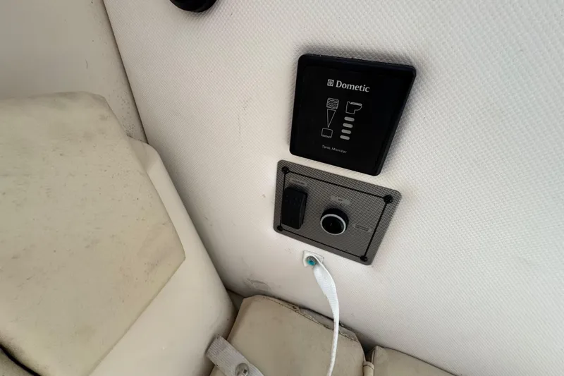 Slide: The Image of Control panel on a 2016 Wellcraft 252 Coastal boat interior. - 35