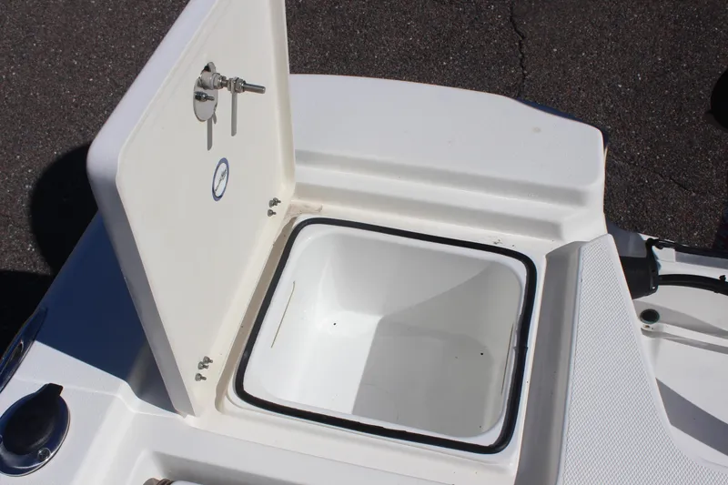 Slide: The Image of Open storage compartment on 2022 NauticStar 227 Bay boat, showcasing interior space. - 37