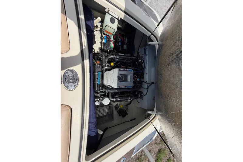 Slide: The Image of Engine compartment of a 2011 Chris-Craft Launch 22 Heritage Edition boat. - 24