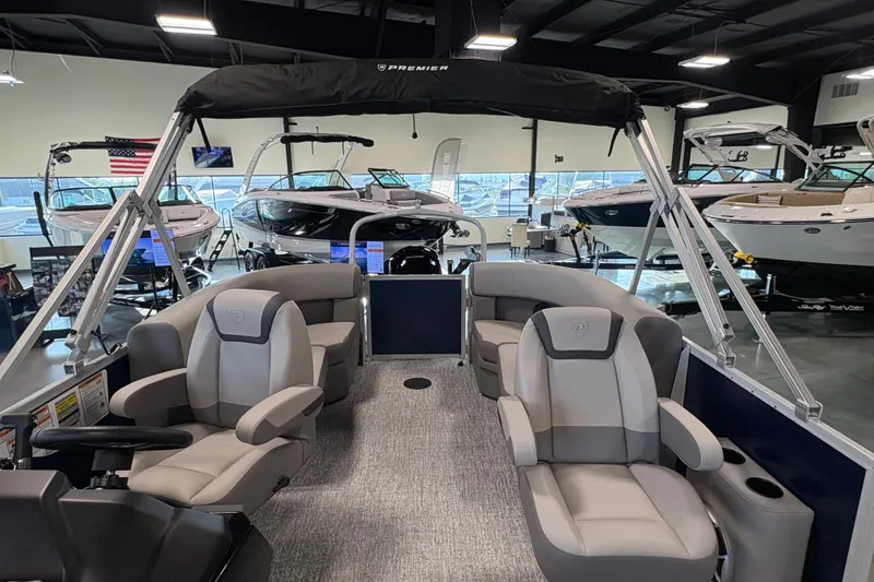 Slide: The Image of 2027 Premier 200 Sunscape RL - CL pontoon boat interior in showroom setting. - 5