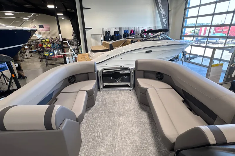 Slide: The Image of Interior view of 2027 Premier 200 Sunscape RL - CL pontoon boat in showroom. - 9