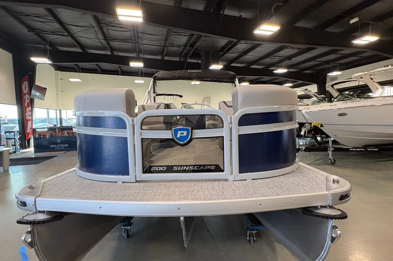 Slide: The Image of 2027 Premier 200 Sunscape RL - CL pontoon boat displayed in showroom. - 17