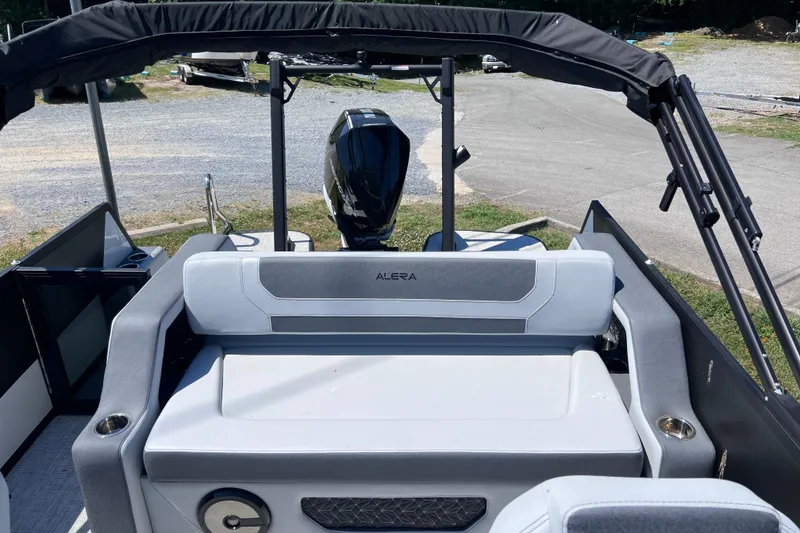 Slide: The Image of Alera M23L 2026 boat interior with seating and motor, showcasing modern design. - 12