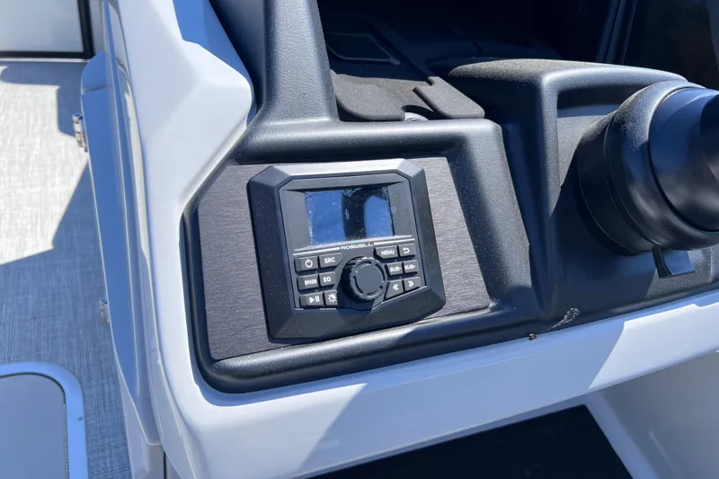 Slide: The Image of Control panel of 2026 Alera M23L boat with digital display and buttons. - 5