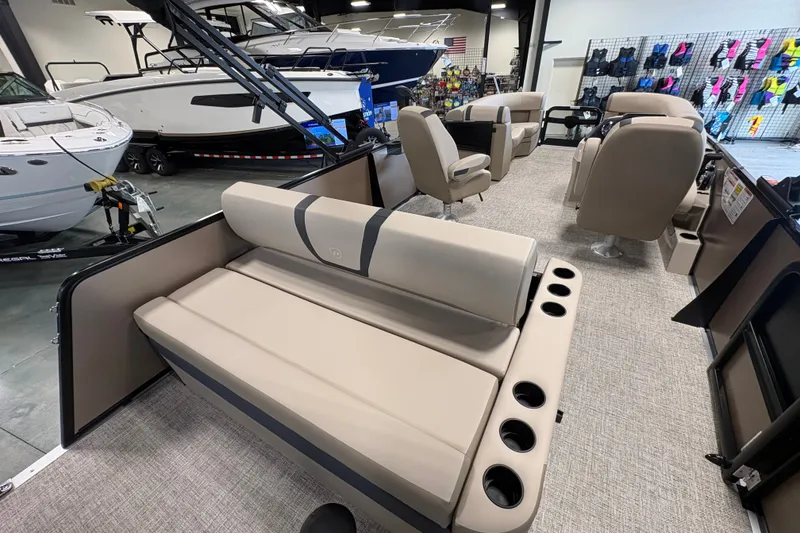 Slide: The Image of Interior of 2027 Premier 220 Sunscape RL - CL pontoon boat with beige seating. - 13