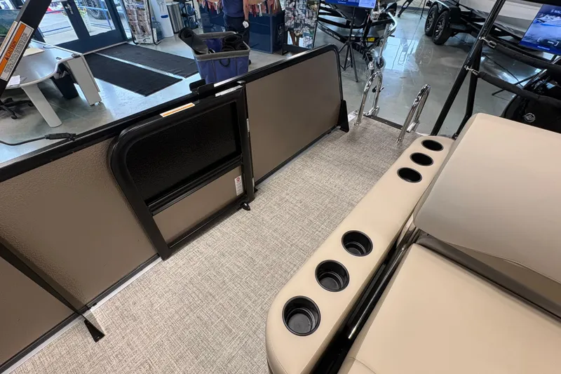 Slide: The Image of Interior of 2027 Premier 220 Sunscape RL - CL boat with cup holders and seating. - 12